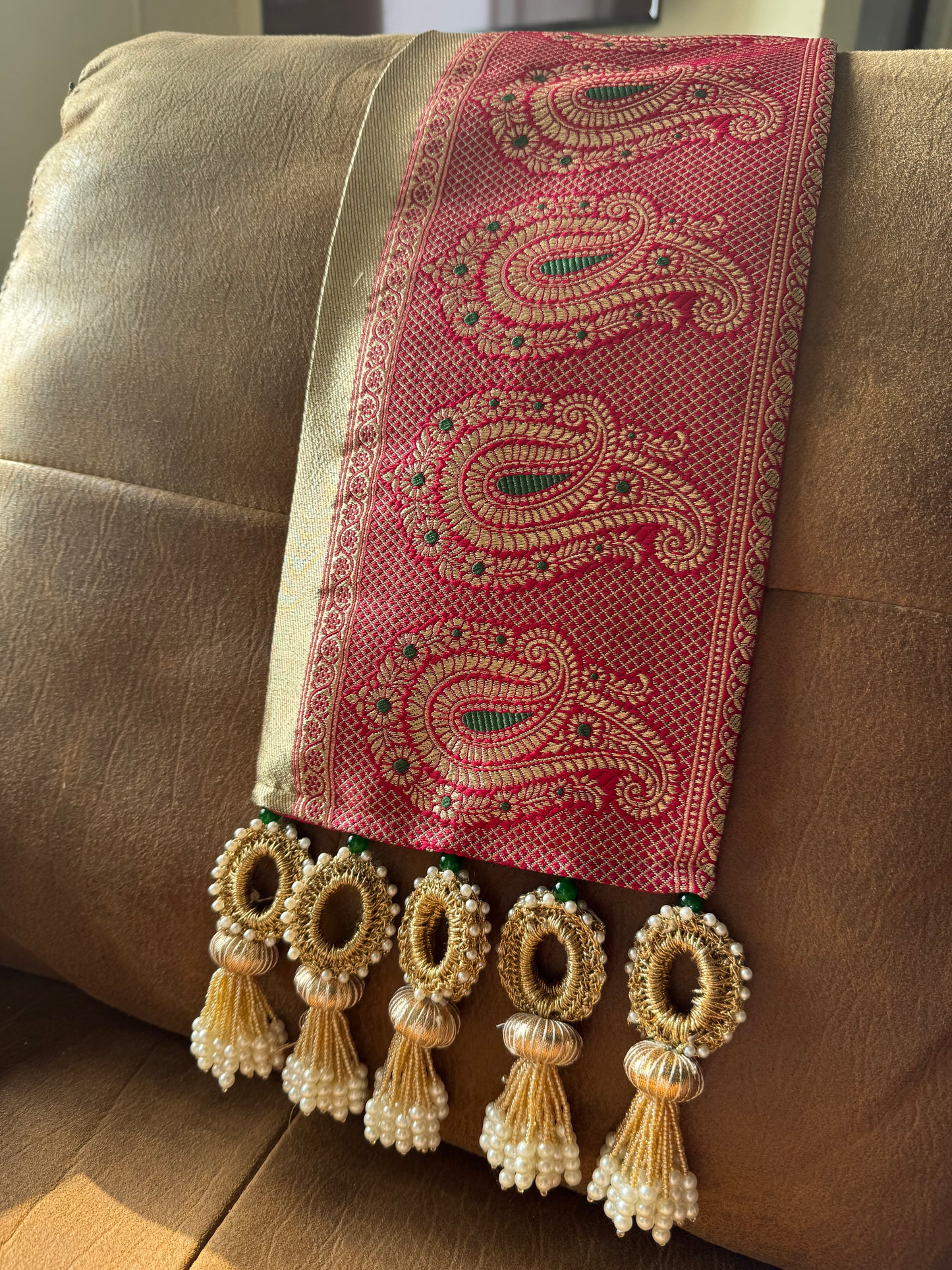 Fuchsia paisley khes with gold zari weave, emerald green highlights, and handcrafted tassels in crochet, gota patti, and pearls – IBHI