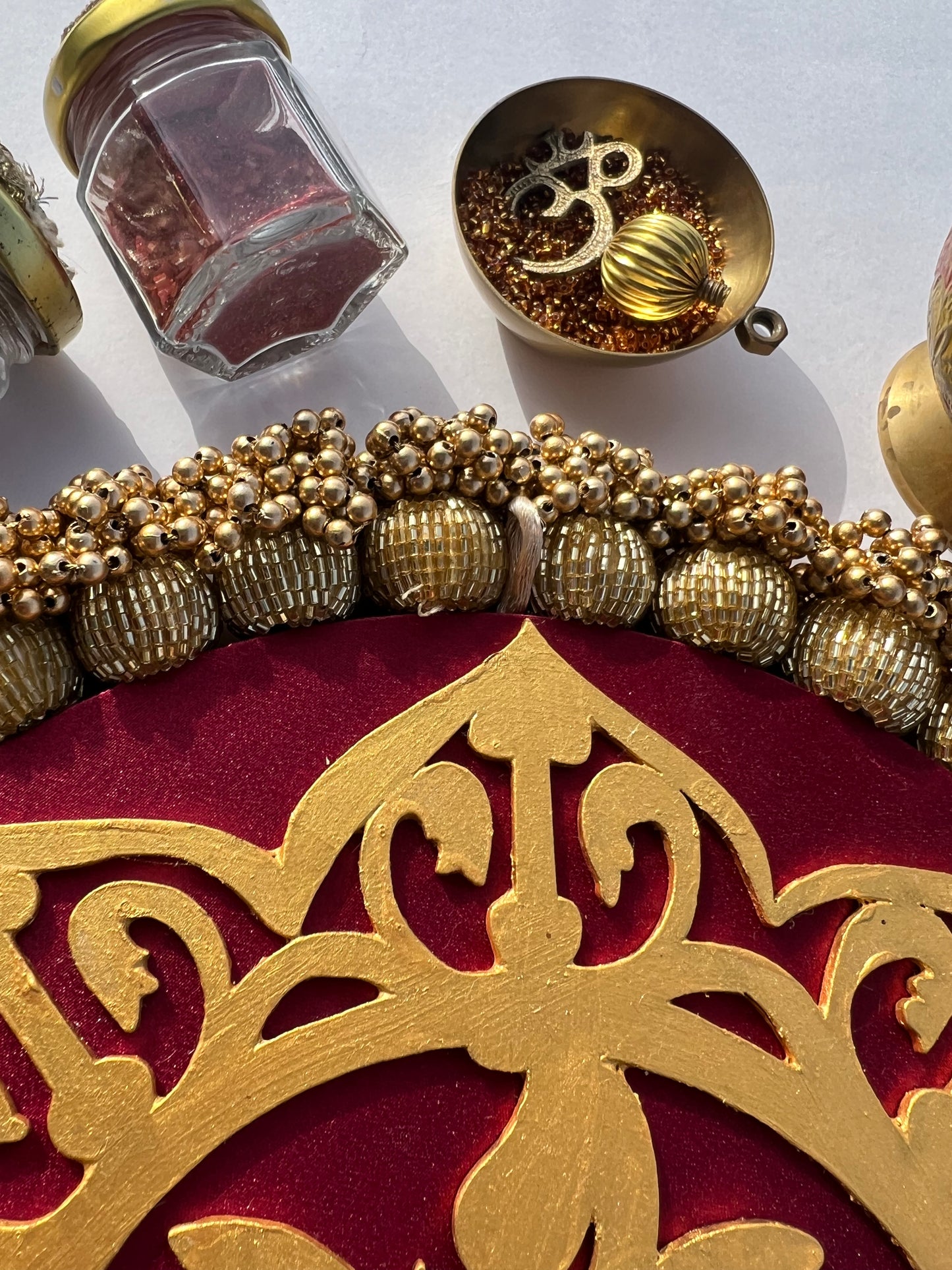 Blossom Ganesh Pallet: Solid Maroon + Kamal Bandhej