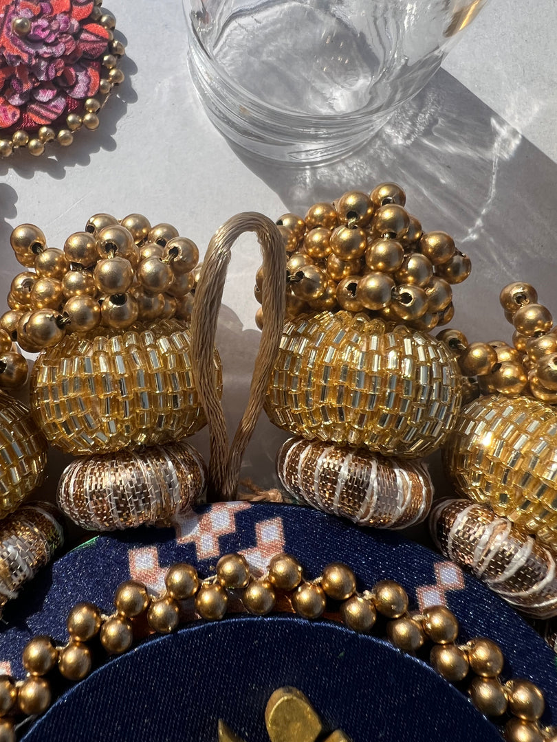 Chaandbali OM Pallet: OG Inflorescence Divine Pichwai + Maroon Navratna Patola