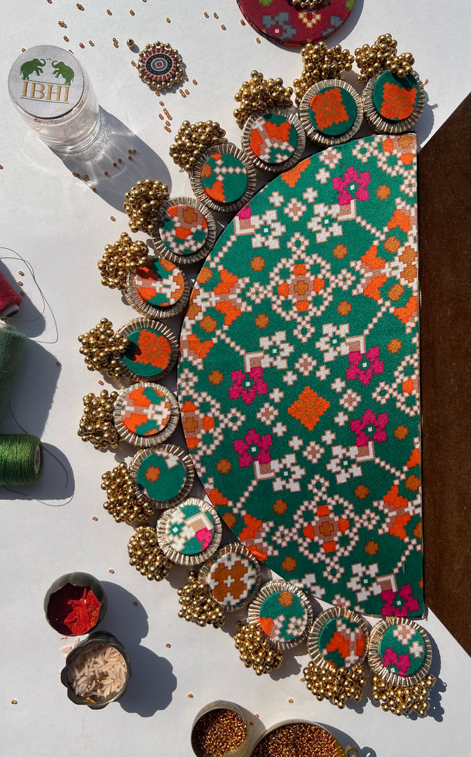 Maroon Navratna Patola and Pink Navratna Patola Arc Lumba Rangoli