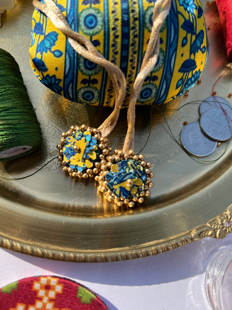 Idiosyncratic Divine Pichwai Little Potli- शगुन wali
