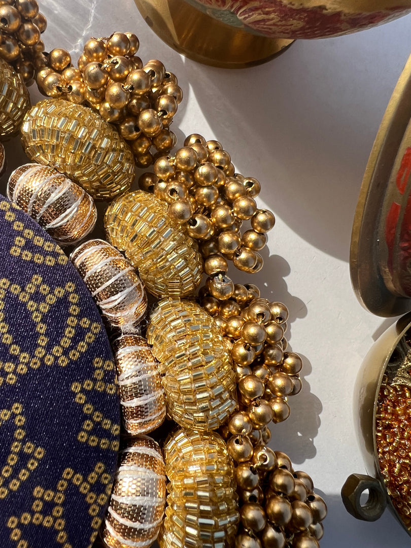 Chaandbali OM Pallet: OG Inflorescence Divine Pichwai + Maroon Navratna Patola