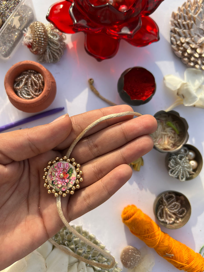 Maroon Navratna Patola Mini Beaded Enchanted Rakhi