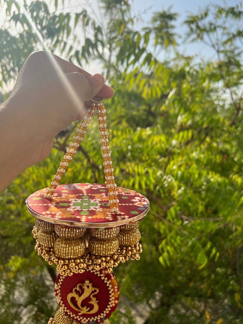 Golden Yellow Navratna Patola Ganesh Pearl Hanging