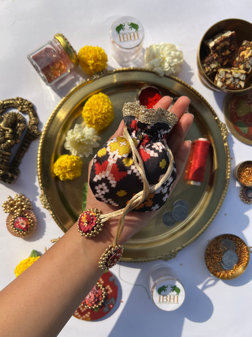 Idiosyncratic Divine Pichwai Little Potli- शगुन wali