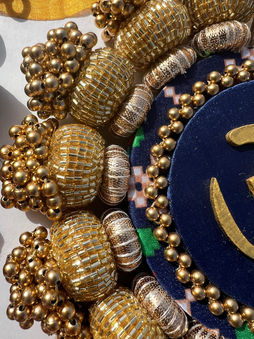 Chaandbali OM Pallet: OG Inflorescence Divine Pichwai + Maroon Navratna Patola