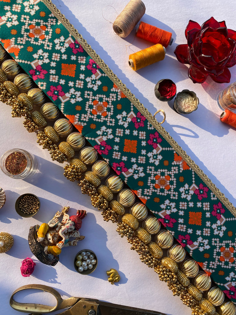 Vermillion Congruous Divine Pichwai and Pink Navratna Patola Tasseled Toran