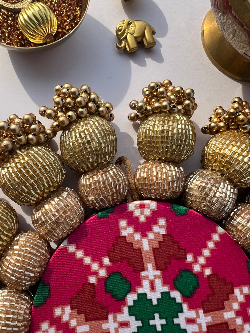 Spherical Chaandbali OG Inflorescence Divine Pichwai and Maroon Navratna Patola Diya Pallet