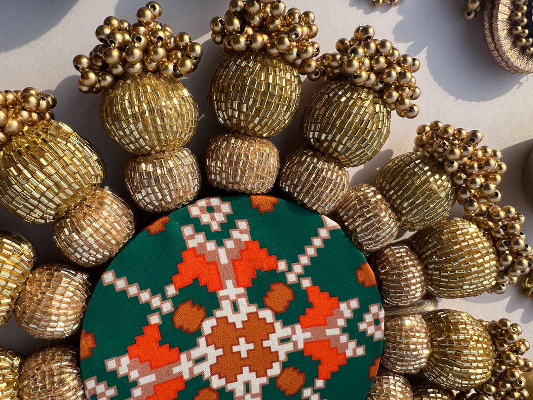 Spherical Chaandbali OG Inflorescence Divine Pichwai and Maroon Navratna Patola Diya Pallet