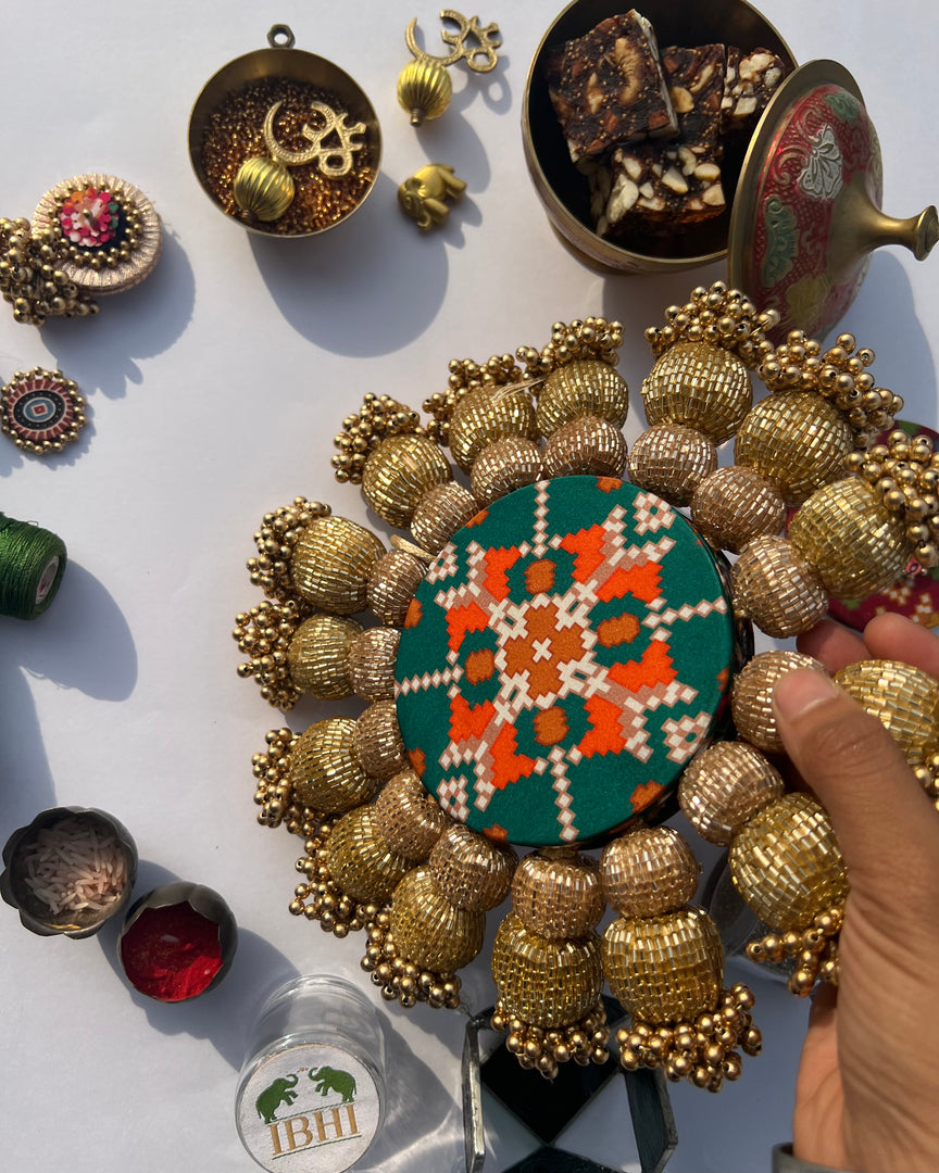 Spherical Chaandbali OG Inflorescence Divine Pichwai and Maroon Navratna Patola Diya Pallet