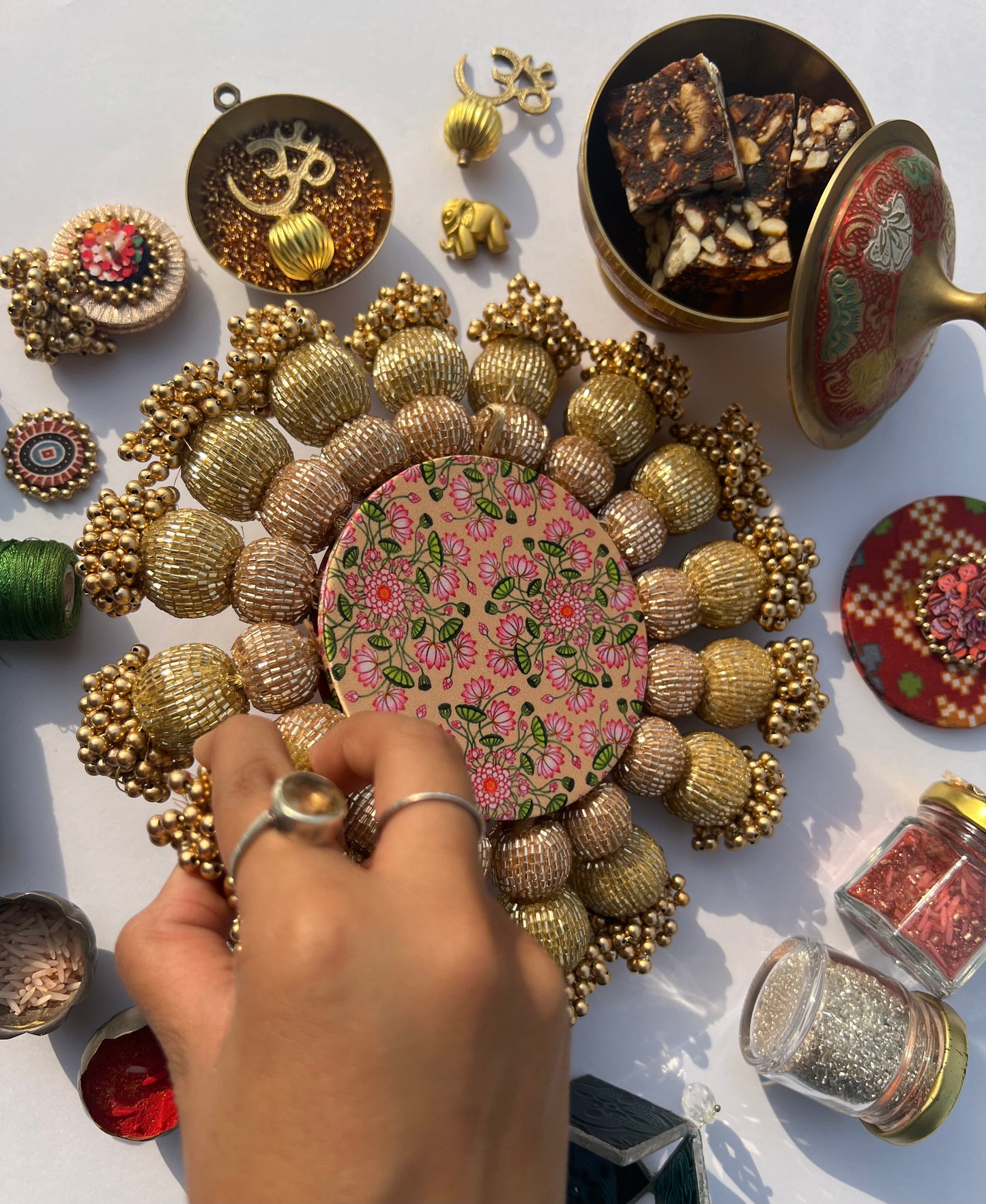 Spherical Chaandbali OG Inflorescence Divine Pichwai and Maroon Navratna Patola Diya Pallet