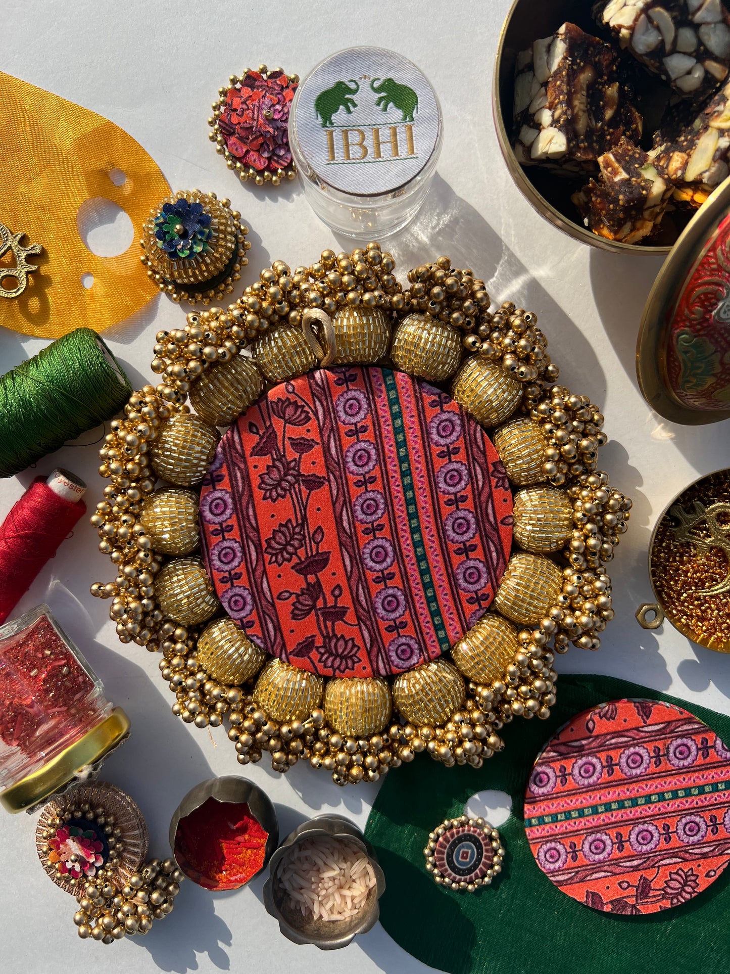 SPHERICAL GANESH PALLET: Bottle Green Navratna Patola + Vermillion Congruous Divine Pichwai