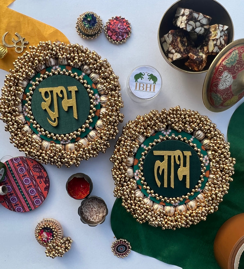 Bottle Green Navratna Patola & Upended Confluence Intense Ajrakh Beaded Shubh Labh Platters- Set of two