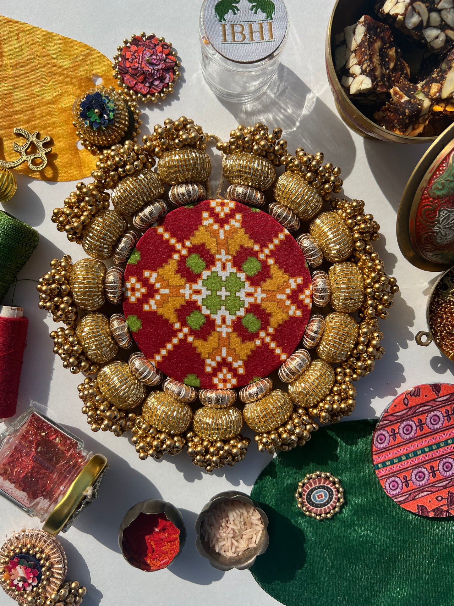 Chaandbali OM Pallet: OG Inflorescence Divine Pichwai + Maroon Navratna Patola