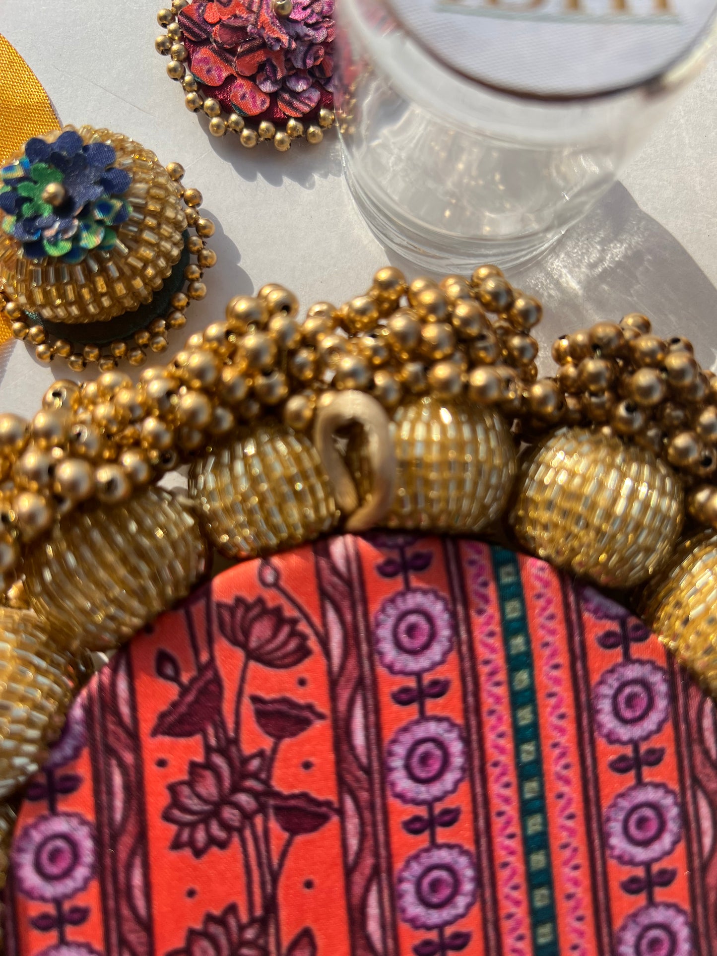 SPHERICAL GANESH PALLET: Bottle Green Navratna Patola + Vermillion Congruous Divine Pichwai