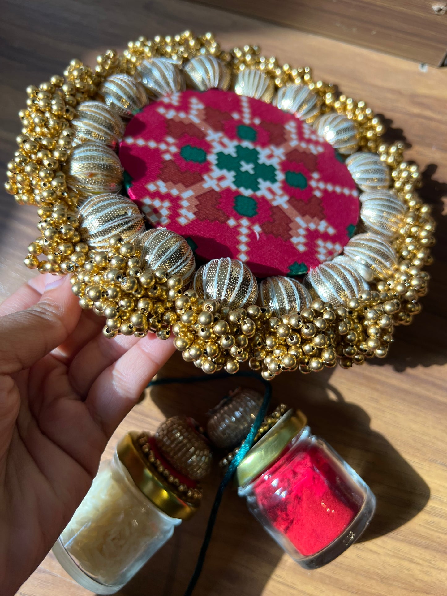Joker Poker Rakhi set: Bottle Green + Pink Navratna Patola