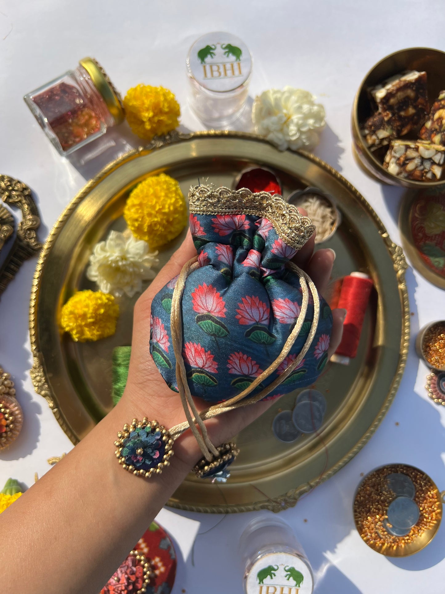 Idiosyncratic Divine Pichwai Little Potli- शगुन wali