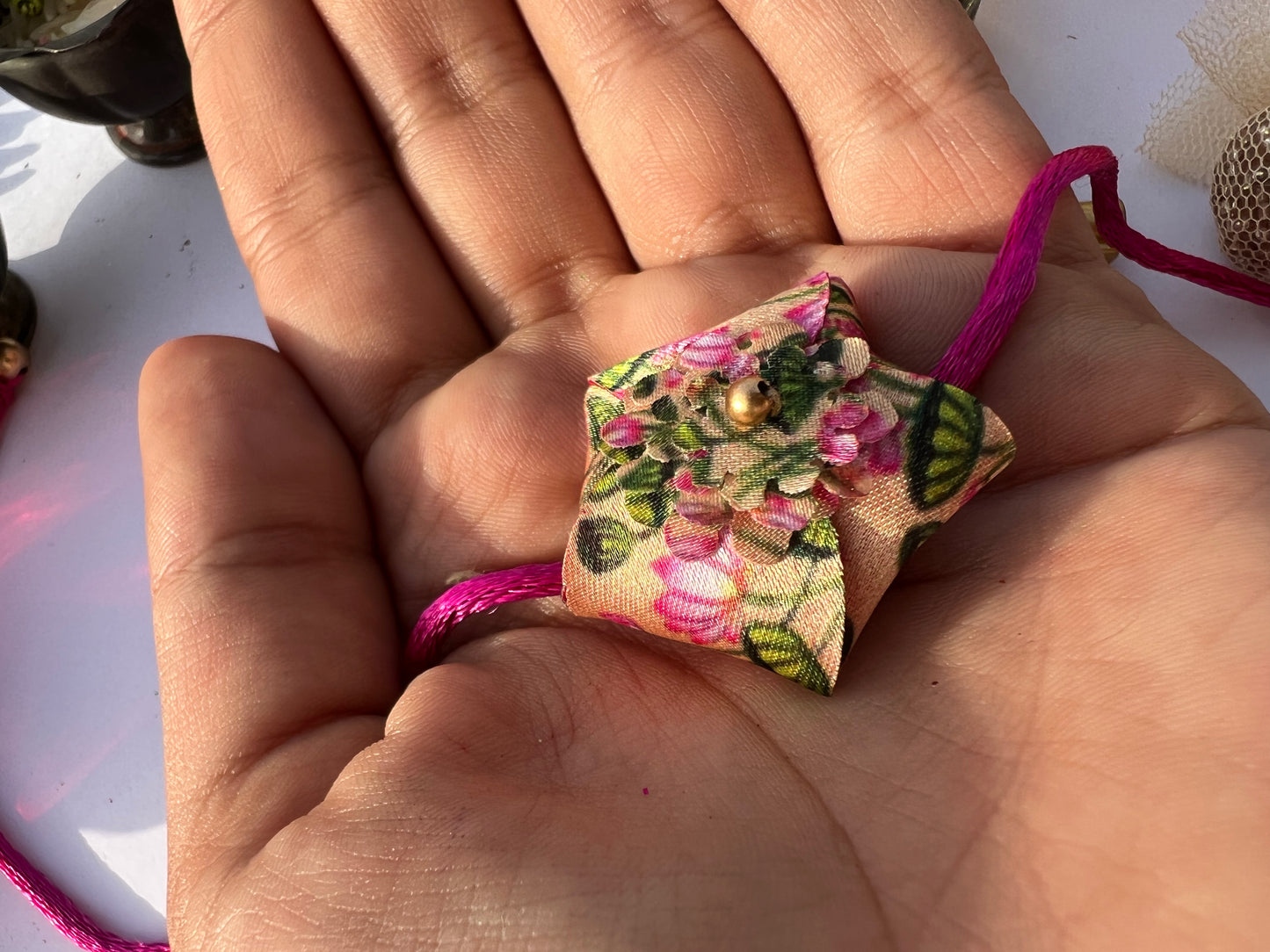 OG Inflorescence Divine Pichwai Plumeria Rakhi