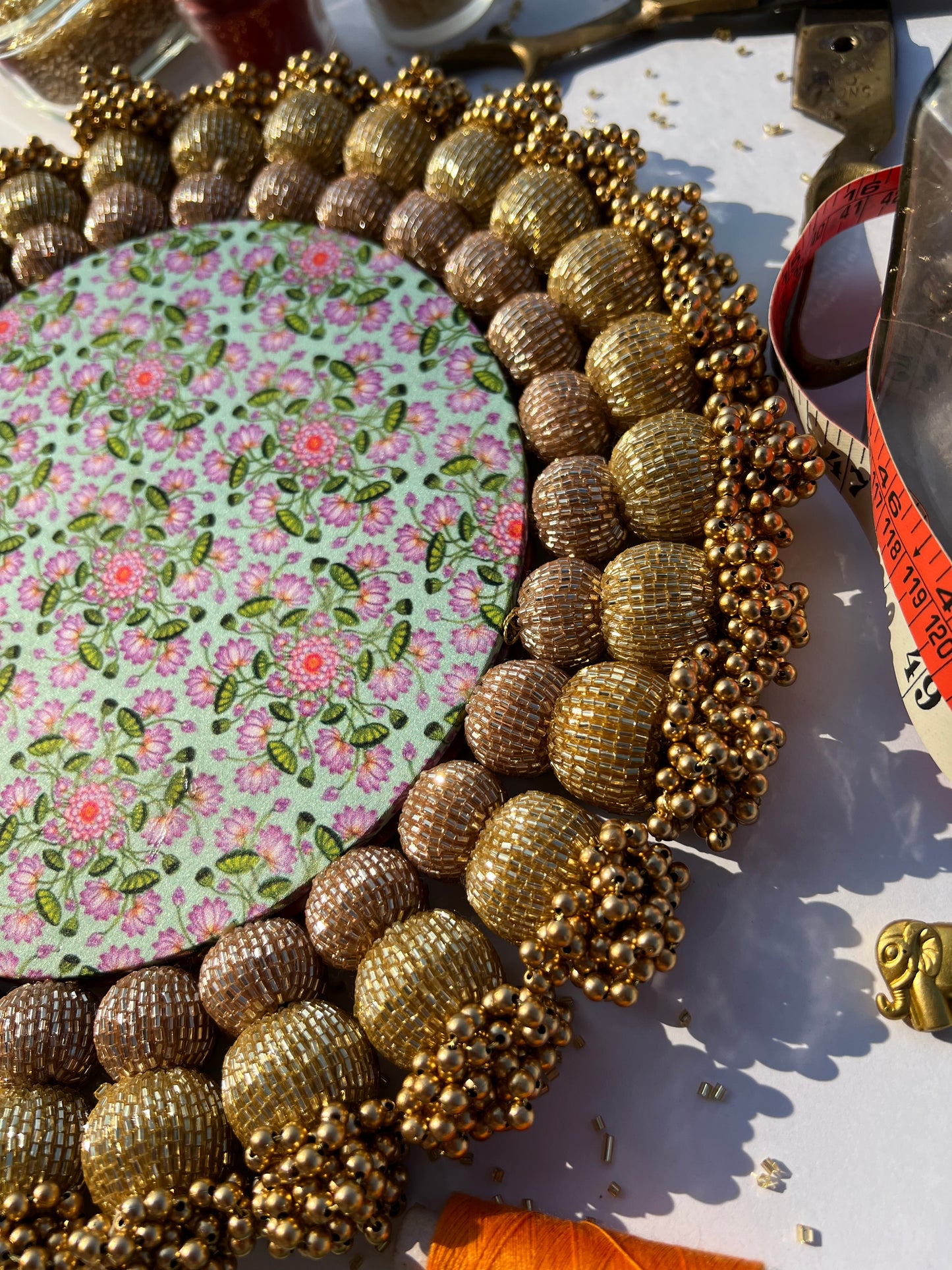 Spherical Chaandbali Pastel Pistachio Inflorescence Divine Pichwai and Pink Navratna Patola Rangoli