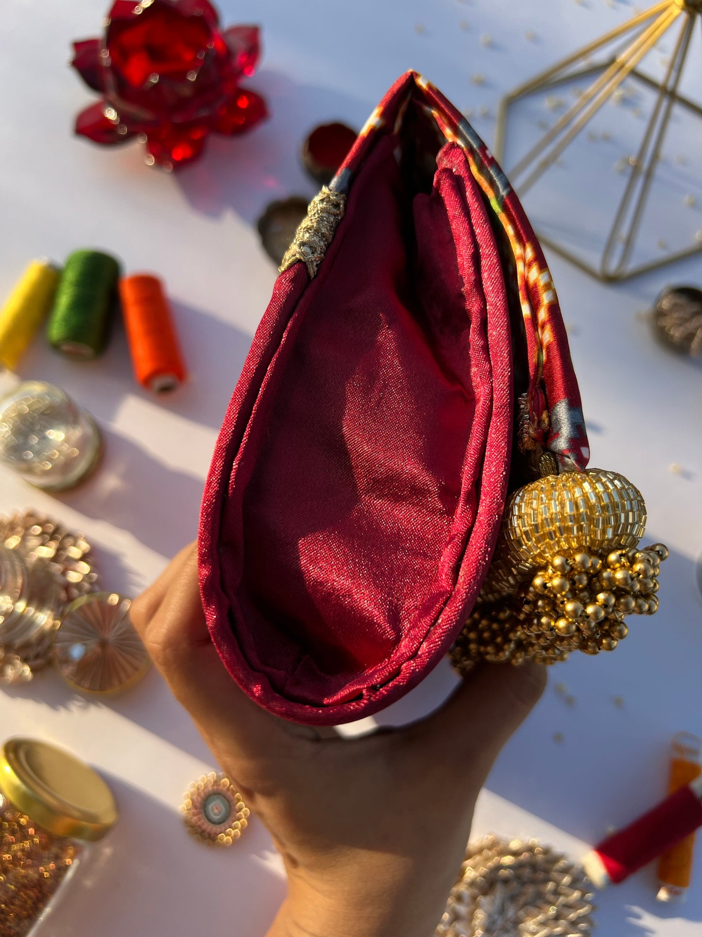 Sylphlike Maroon Navratna Patola Micro Beaded X Solid Silk Clutch