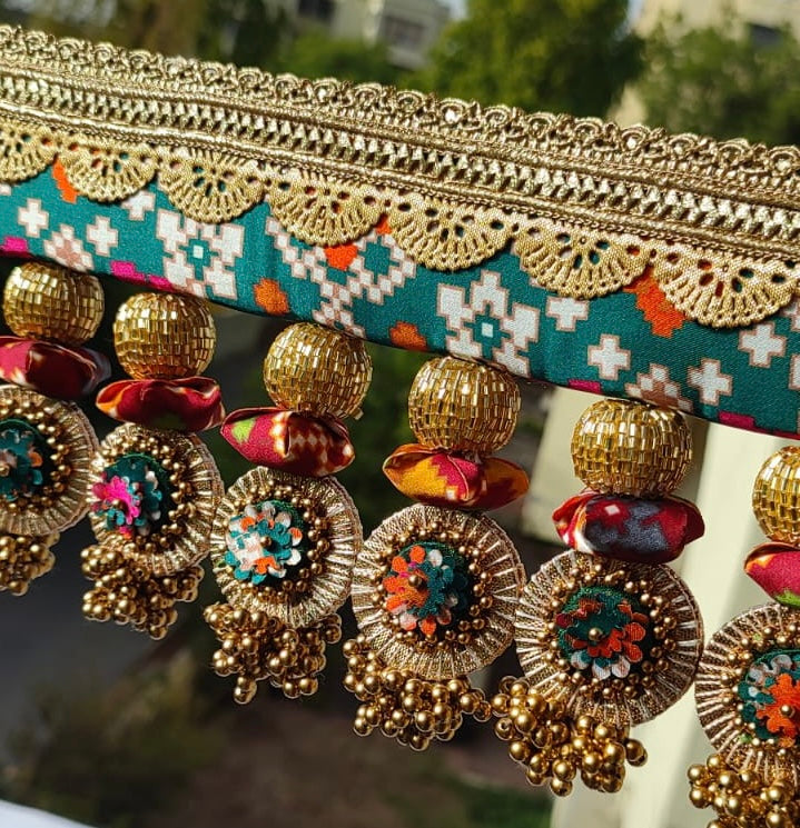 SLEEK: Maroon & Bottle Green Navratna Patola Plumeria Toran (SOLID)