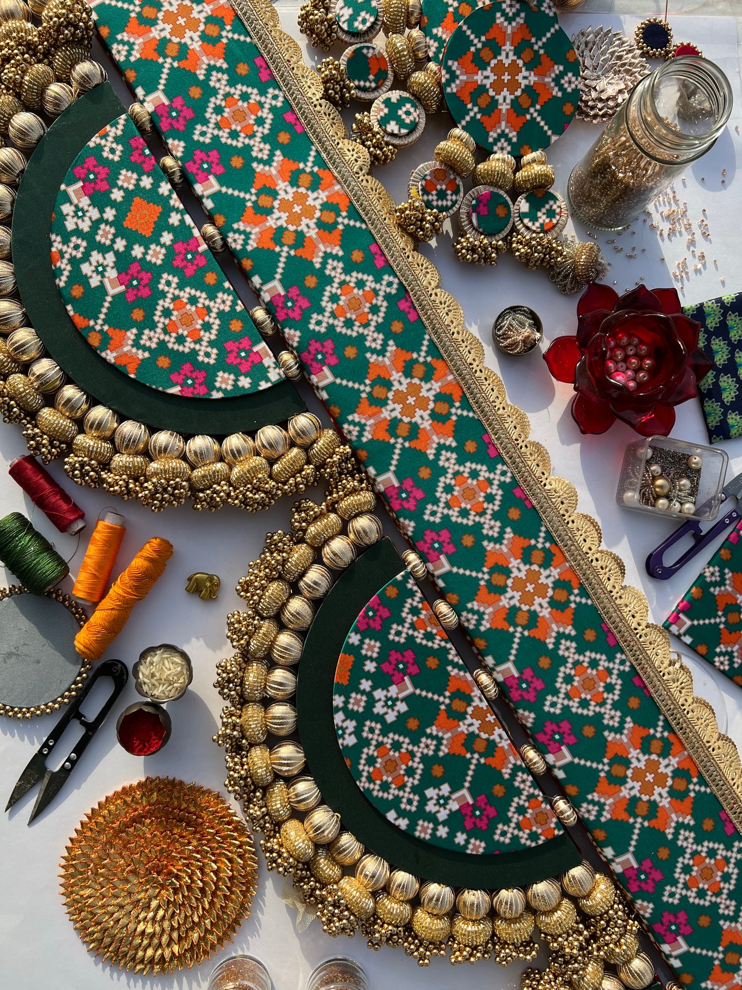 The Enchanted Chandbali: Maroon & Bottle Green Navratna Patola Two Way Toran (SOLID)