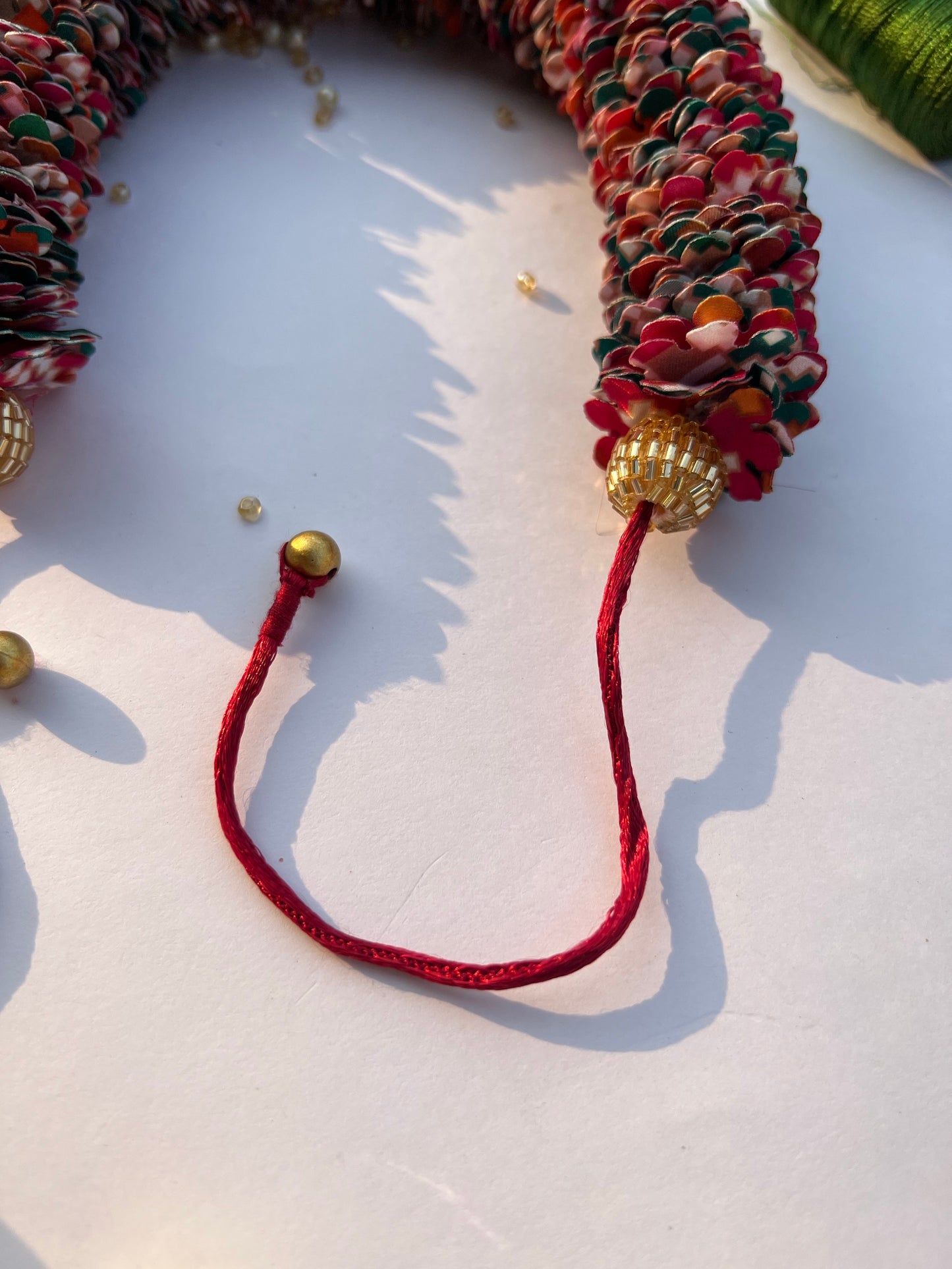 Pink & Bottle Green Navratna Patola Gajra- FLOWER GARLAND FOR HAIR