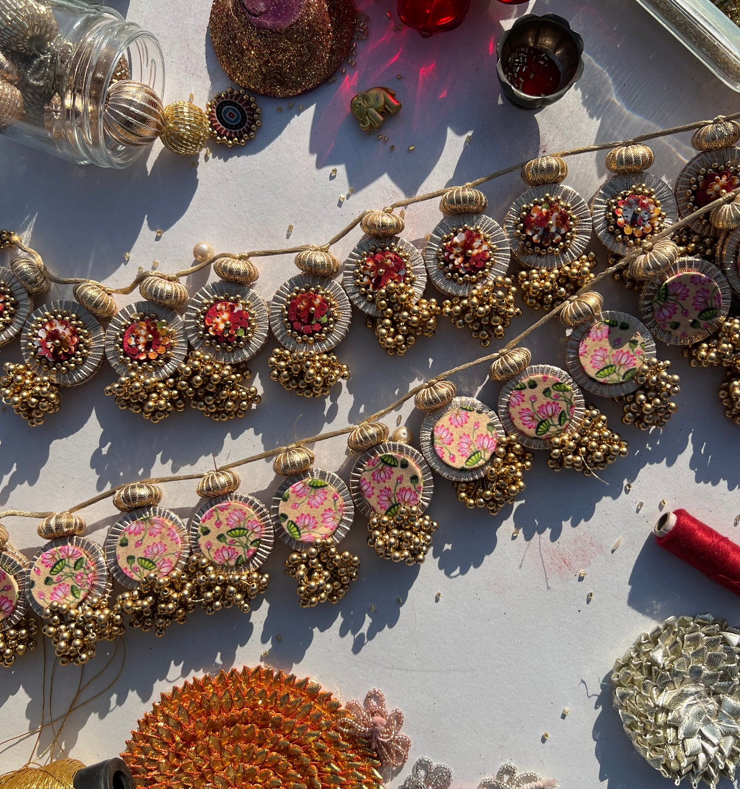 Classy Maasi Maroon Navratna Patola + OG Inflorescence Divine Pichwai Classic Lumba Toran (Flexible)