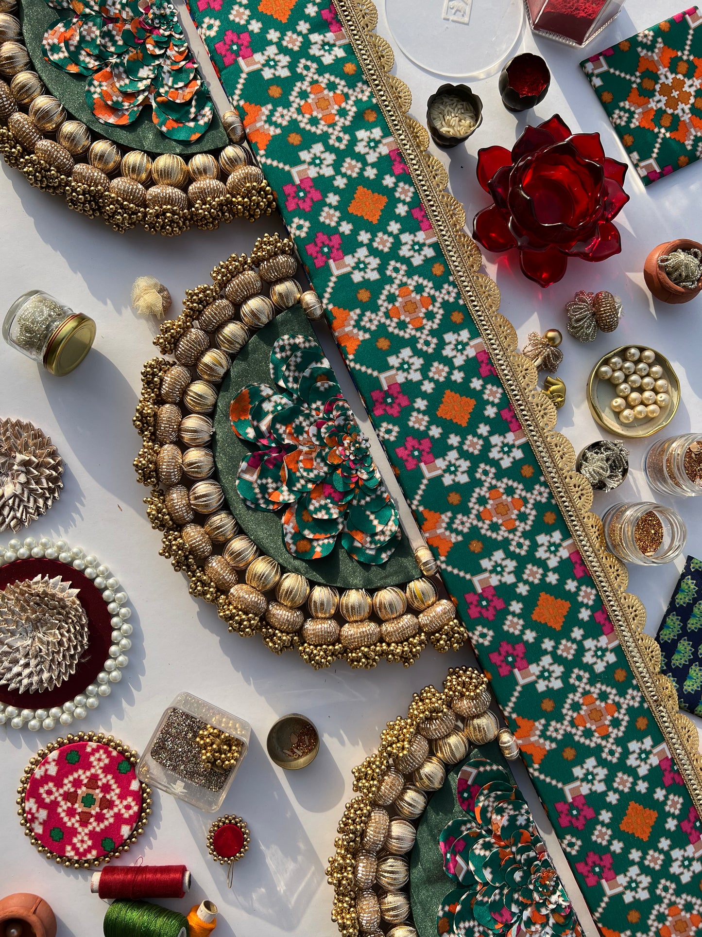 The Enchanted Chandbali: Bottle Green Navratna & Royal Blue Hathi Popat Patola Two Way Toran (SOLID)