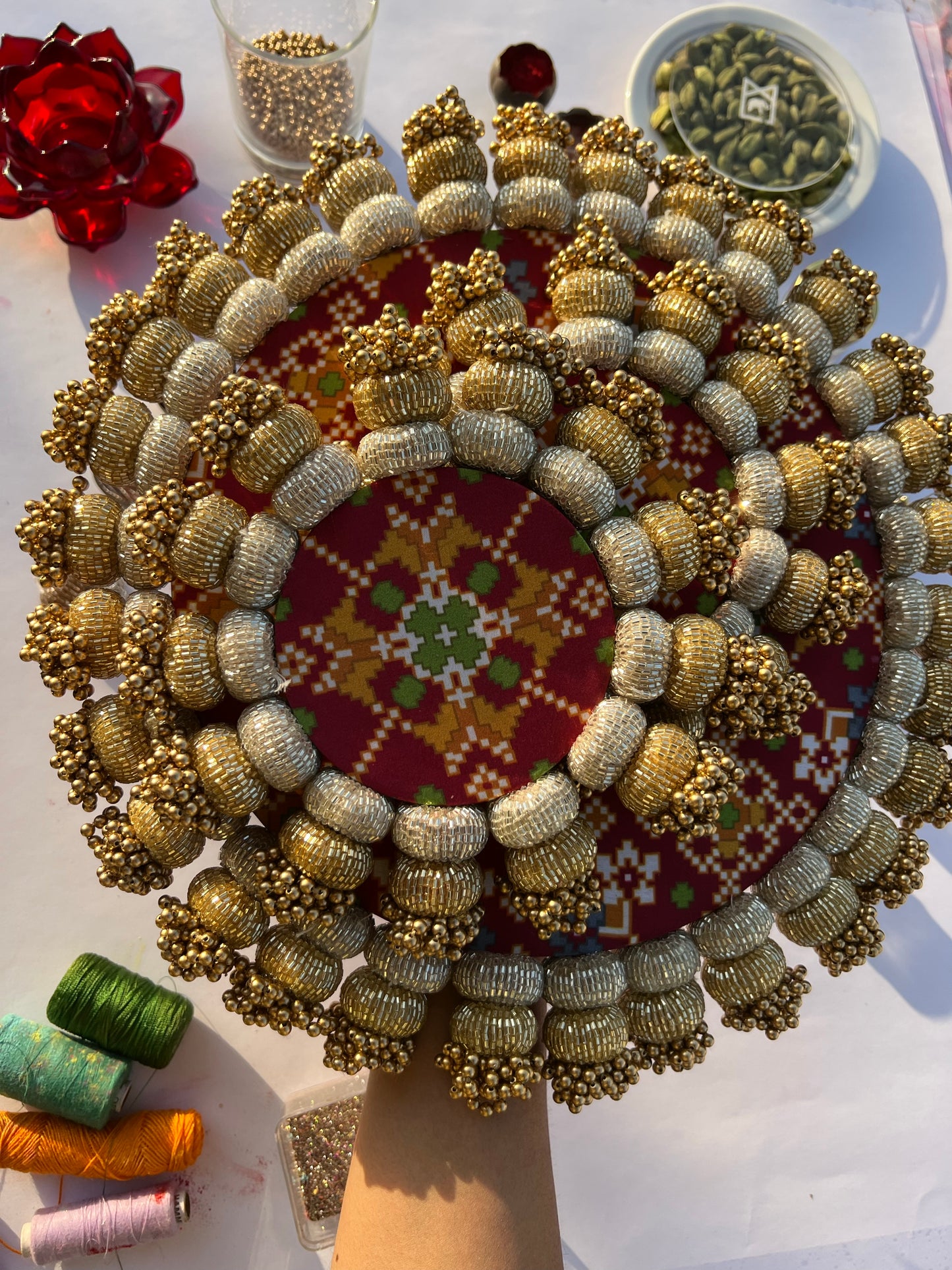 Chaandbali Maroon Navratna Patola & Inflorescence Divine Pichwai Rangoli + Diya Pallets