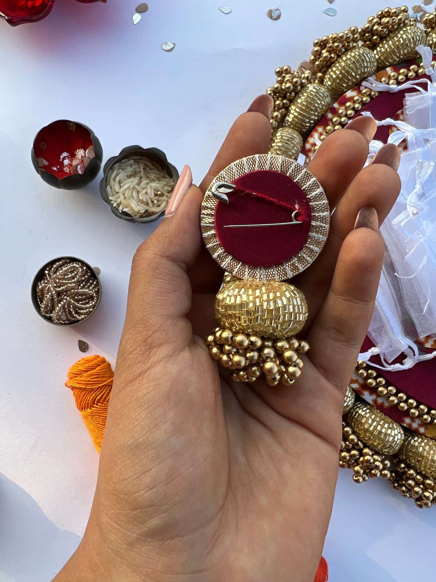Enchanted Maroon Navratna Patola Beaded Brooch