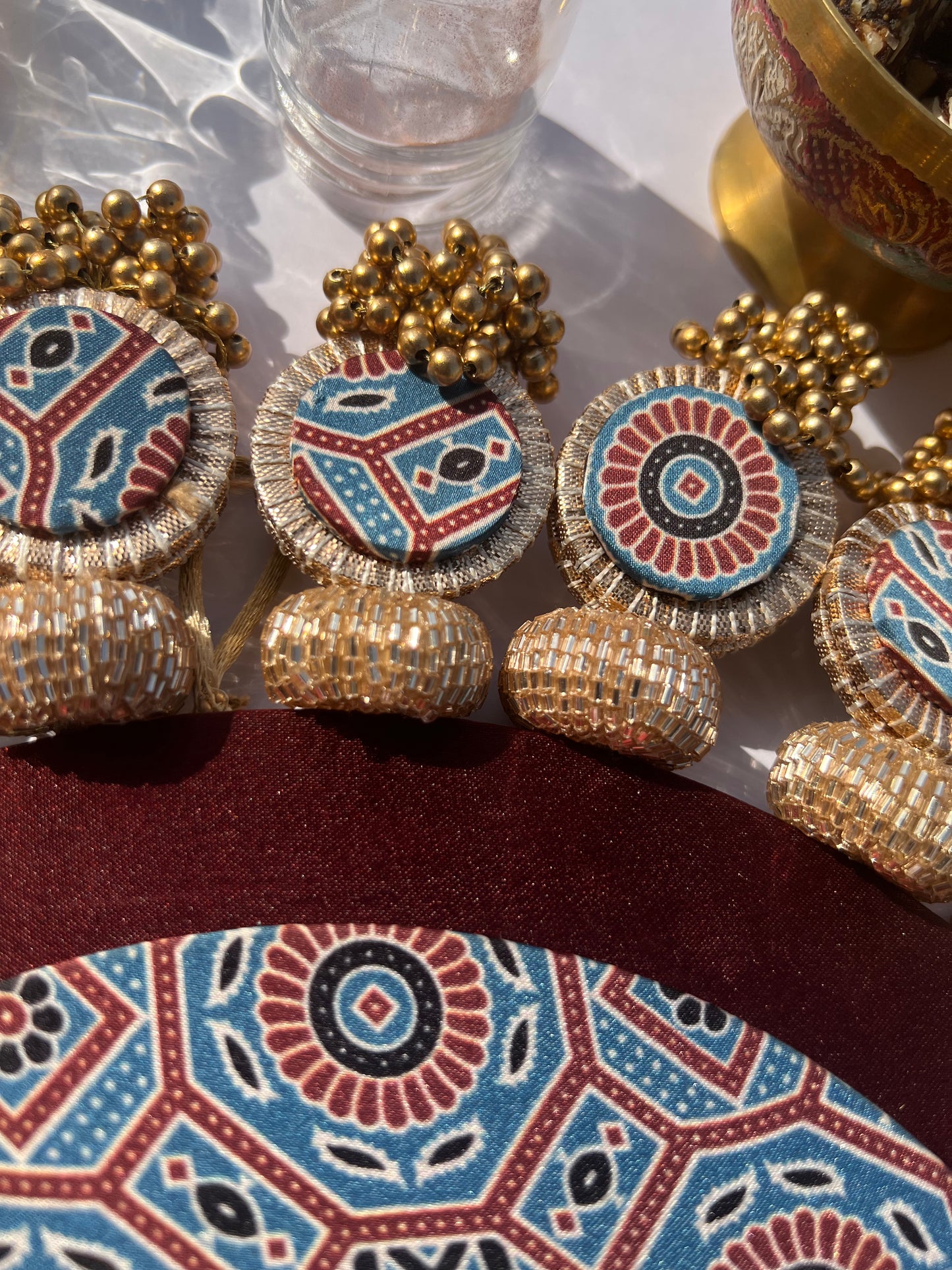 Ajrakh + Pastel Pistachio Inflorescence Divine Pichwai Glass Rhapsody Lumba Rangoli