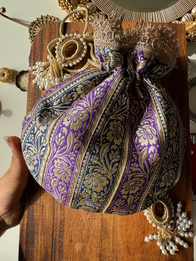Royal blue and purple Paithani potli bag named Indra-Raag with zari detailing – ideal for weddings, festive gifting, and evening elegance by IBHI.

