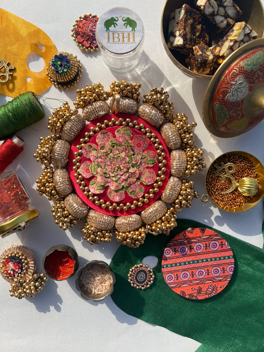 Pichwai bloom platter with pink silk and hand-stitched tassels