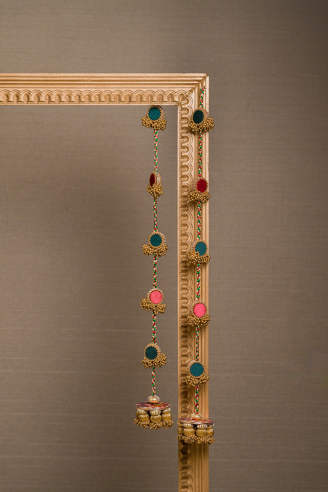 Deepa Shree maroon green and golden handcrafted Indian hanging with Patola-inspired dangler, glass beads and gota patti by IBHI