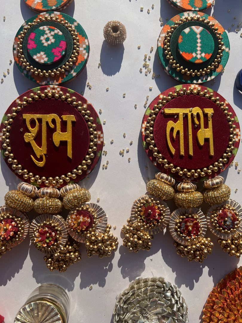 Awe-inspiring Shubh labh : Maroon Navratna Patola + Pastel Pistachio Infloresence Divine Pichwai