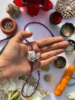 Load image into Gallery viewer, OG Inflorescence Divine Pichwai Plumeria Rakhi
