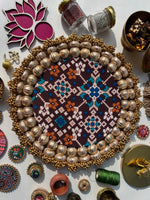 Load image into Gallery viewer, Beauty on Duty Medium: Ambadaal Bandhej + Chocolate Brown Navratna Patola Pallet- 8 inches basal diameter | 12 inches total diameter