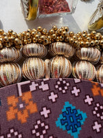 Load image into Gallery viewer, Beauty on Duty Rangoli Large: Hazelnut Brown + Purple Navratna Patola
