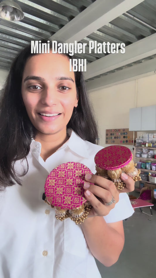 Chandkali pink dangler platter with floral weave, pink silk back, gold glass bead and gota patti tassels – available in 3" and 4" sizes

