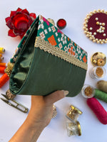 Load image into Gallery viewer, Seven Heaven Bottle Green Navratna Patola Micro Beaded Solid Silk Clutch