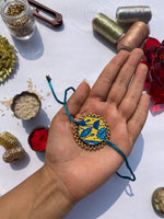 Load image into Gallery viewer, Congruous Divine Pichwai Male Beaded Rakhi