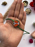 Load image into Gallery viewer, Miniature Bottle Green Navratna Patola Enchanted Prakash Rakhi
