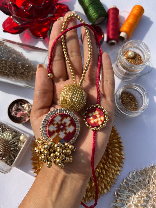 Maroon Navratna Patola Couple Rakhi Ensemble III