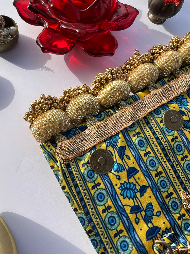 Seven Heaven Yellow Congruous Divine Pichwai Micro Beaded X Solid Silk Clutch