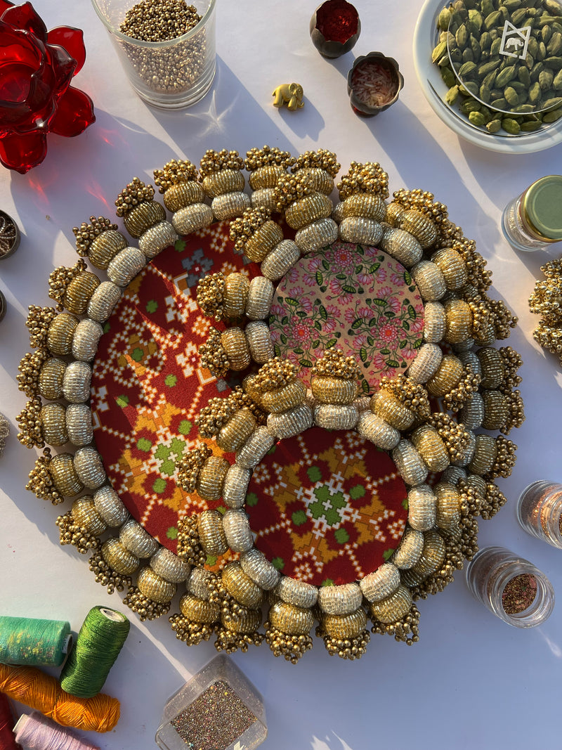 Chaandbali Maroon Navratna Patola & Inflorescence Divine Pichwai Rangoli + Diya Platters