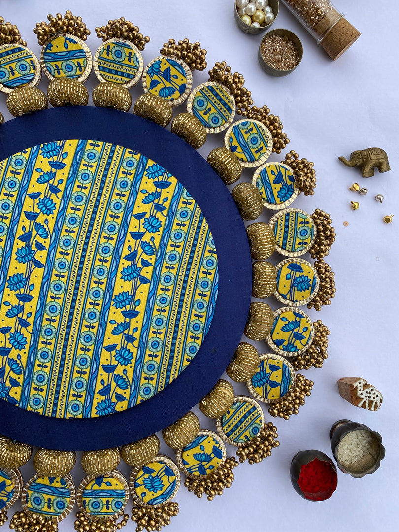 Two Way: Idiosyncratic & Congruous Divine Pichwai Glass Rhapsody X Lumba Rangoli