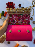 Load image into Gallery viewer, patola printed braded clutch for party.