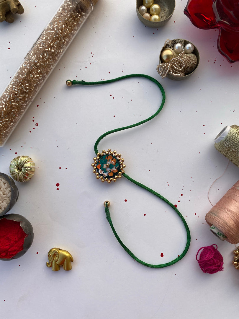 Miniature Bottle Green Navratna Patola Enchanted Prakash Rakhi