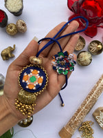Load image into Gallery viewer, Couple Rakhi: Navy Blue Navratna Patola Beaded Silk Thread Lumba &amp; Enchanted Rakhi